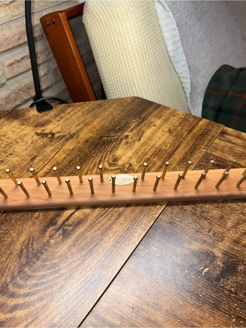 Brass Peg Wall Rack in Natural Wood